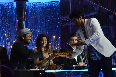 Aditya Roy Kapur distributes sweets to the Judges on Jhalak Dikhhlaa Jaa