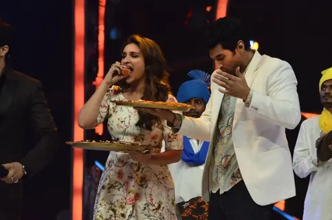 Parineeti and Aditya enjoying sweets on Jhalak Dikhhlaa Jaa