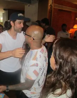 Hrithik Roshan hugging Aalim Hakim at his Surprise Birthday Bash