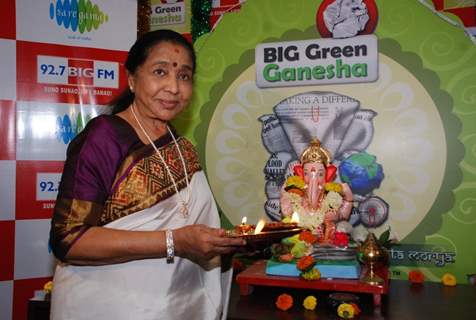 Asha Bhosle poses for the media at 92.7 Big FM Studio