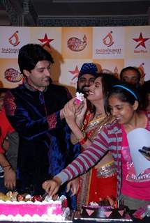 Anas Rashid feeds the cake to Deepika Singh at the Celebration
