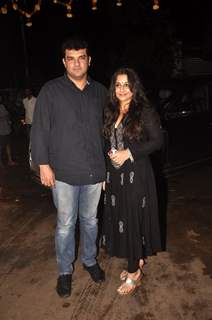 Siddharth Roy Kapoor and Vidya Balan pose for the media at the Screening of Finding Fanny