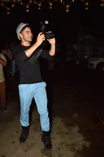 Varun Dhawan snapped clicking photos with a DSLR at the Screening of Finding Fanny