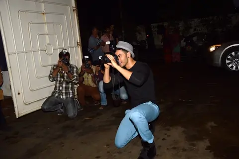 Varun Dhawan snapped clicking photos with a DSLR at the Screening of Finding Fanny