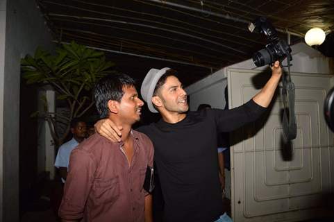 Varun Dhawan snapped clicking a selfie with a DSLR at the Screening of Finding Fanny