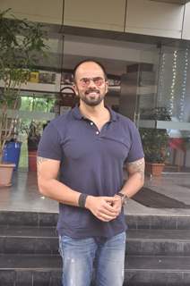 Rohit Shetty poses for the media at Whistling Woods