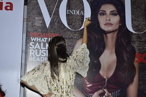 Sonam Kapoor signs an issue of Vogue India, at the Vogue Night Out