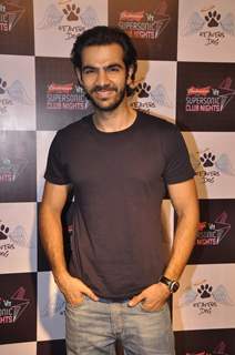 Karan V Grover poses for the media at the Launch of Heavens Dog Resturant