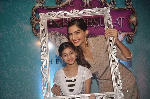 Sonam Kapoor poses with a fan at the Promotions of Khoobsurat at Viviana Mall, Thane
