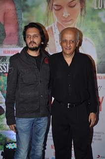 Vishesh Bhatt and Mukesh Bhatt pose for the media at the Success Bash of Finding Fanny