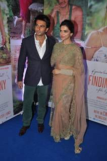 Ranveer Singh and Deepika Padukone pose for the media at the Success Bash of Finding Fanny