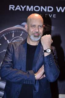 Loy Mendosa pose with a watch at the Launch of Raymond Weil Store