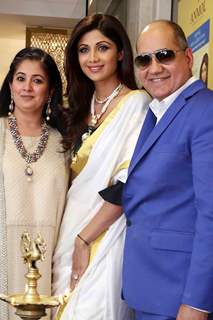 Shilpa Shetty poses with guests at the inauguration of a Jewelry showroom in New Delhi