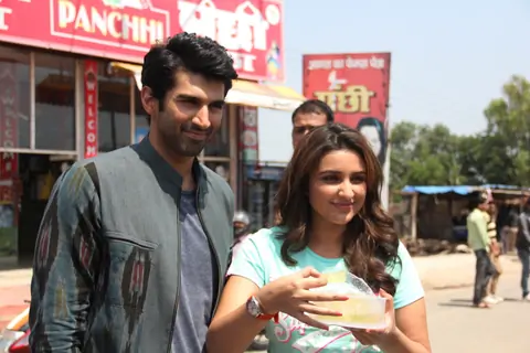 Aditya and PArineeti enjoying petha at Daawat-e-Ishq Food Yatra