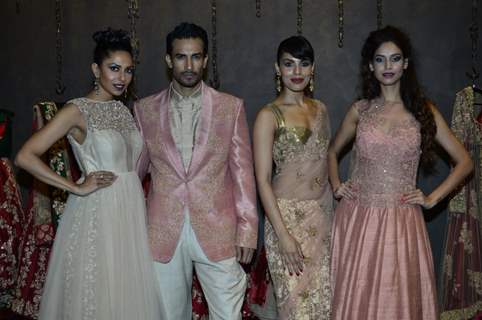Models showcase the designs at the Store Launch of Shyamal Bhumika