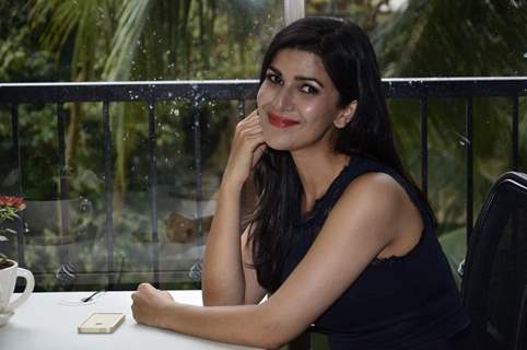 Nimrat Kaur gives a smiling pose for the camera at the Launch of Juice Magazine