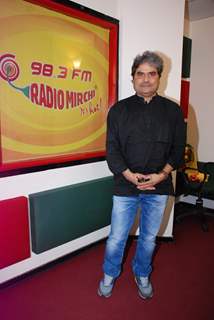 Vishal Bharadwaj poses for the media at Radio Mirchi Studio