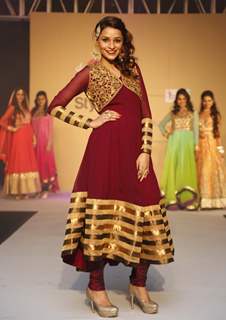 Model showcase the designs at Femina Style Diva 2014 Curtain Raiser