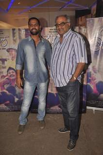 Boney Kapoor poses with a friend at the Screening of Marathi Movie Taapal