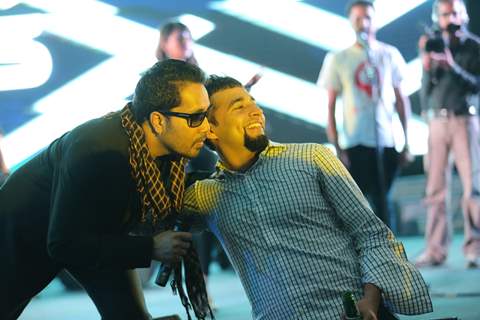 A fan clicks a picture with Mika Singh as Bindass Celebrates 7th Anniversary