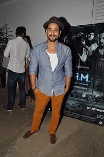 Kunal Khemu poses for the media at the Premier of 3AM