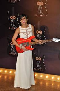 Mandira Bedi poses with a guitar at the GQ Men of the Year Awards