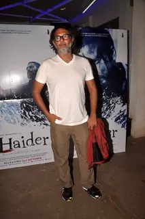 Rakesh Omprakash Mehra poses for the media at the Special Screening of Haider
