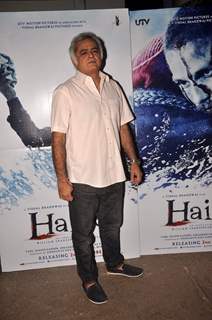 Hansal Mehta poses for the media at the Special Screening of Haider