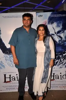 Siddharth Roy Kapoor and Vidya Balan pose for the media at the Special Screening of Haider