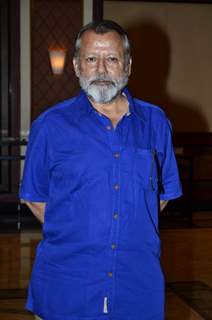 Pankaj Kapoor poses for the media at the Book Launch of Haider, Omkara and Maqbool