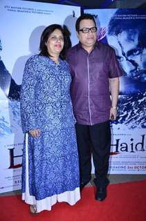 Ramesh Taurani poses with wife at the Special screening of Haider