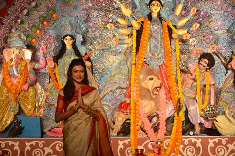 Sushmita Sen poses for the media at Durga Pooja