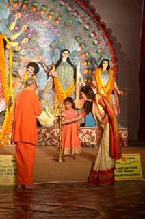 Sushmita Sen lighting the lamp at Durga Pooja