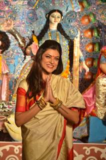 Sushmita Sen poses for the media at Durga Pooja