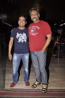 Anubhav Sinha poses with a friend at the Special Screening of Haider hosted by Tabu