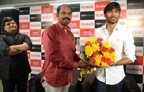 Dhanush felicitated at the Filmfare Readers Meet at the Reliance Digital Store