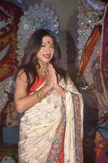 Rituparna poses for the media at DN Nagar Durga Pooja