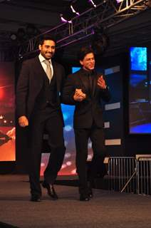 Shah Rukh Khan and Abhishek Bachchan walk the ramp at the Palam Silks, Happy New Year Event