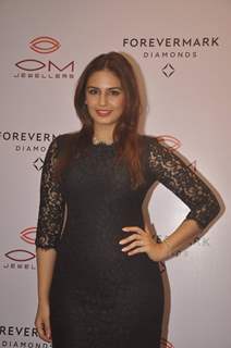 Huma Qureshi poses for the media at Om Jewelers Store