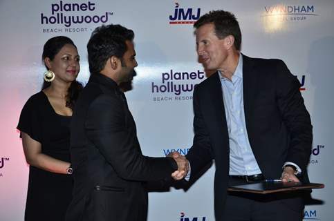 Sachin Joshi greets a delegate at the Launch of Planet Hollywood