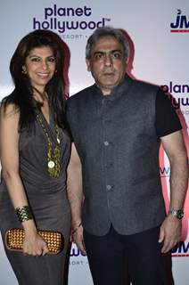 Zeba Kohli poses with her husband at the Launch of Planet Hollywood