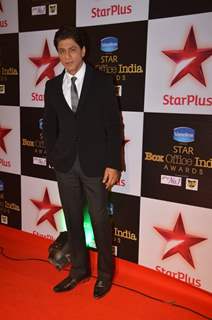 Shah Rukh Khan poses for the media at the Star Box Office Awards