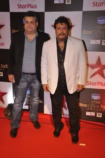 Tigmanshu Dhulia poses with a friend at Star Box Office Awards