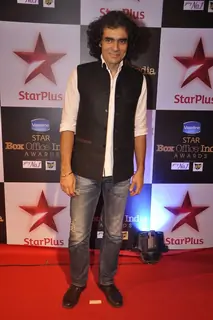Imtiaz Ali poses for the media at the Star Box Office Awards