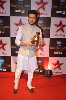 Riteish Deshmukh poses for the media at Star Box Office Awards
