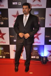 Siddharth Roy Kapur poses for the media at Star Box Office Awards