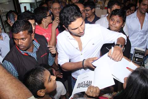 Yuvraj Singh autographs Vikram Sathye's Book at the Launch