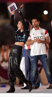 Priyanka Chopra cheers at the Opening Ceremony of the Indian Super League