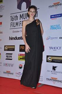 Kalki Koechlin poses for the media at the 16th MAMI Film Festival