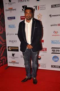 Anurag Kashyap poses for the media at the 16th MAMI Film Festival